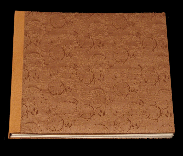 by Karen Hanmer.
Sewn boards binding.
Pigment inkjet prints.
Silk brocade cover with goatskin spine.
Edition 4 of 25.
2006.